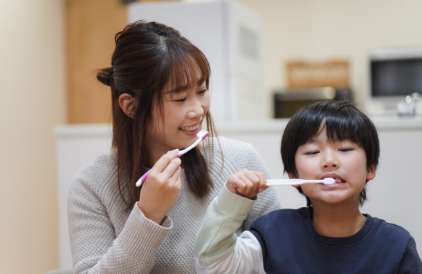 Child brushing teeth